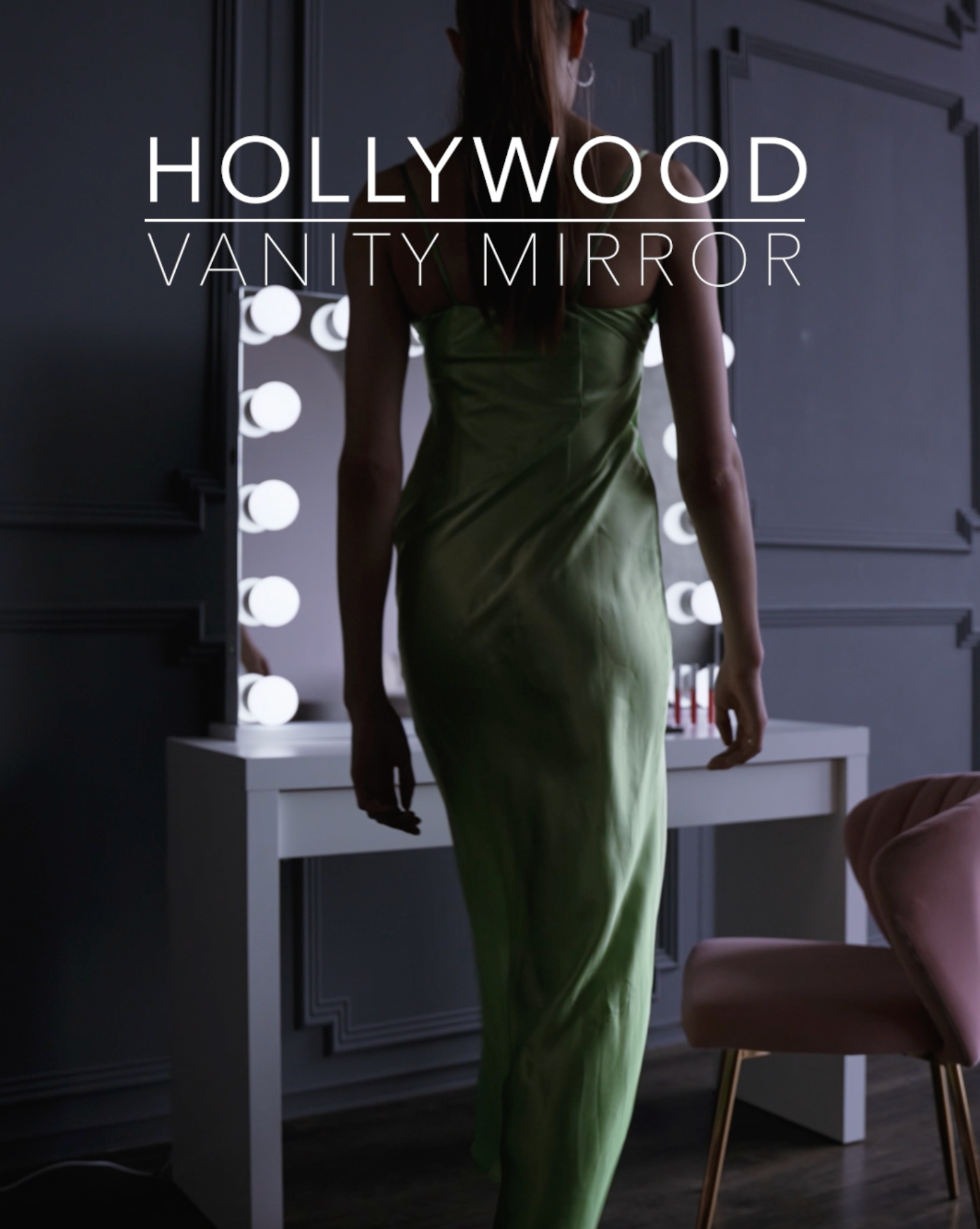 Load video: Video showcasing a Hollywood-style vanity mirror with illuminated bulbs framing the edges, reflecting a glamorous makeup setup.